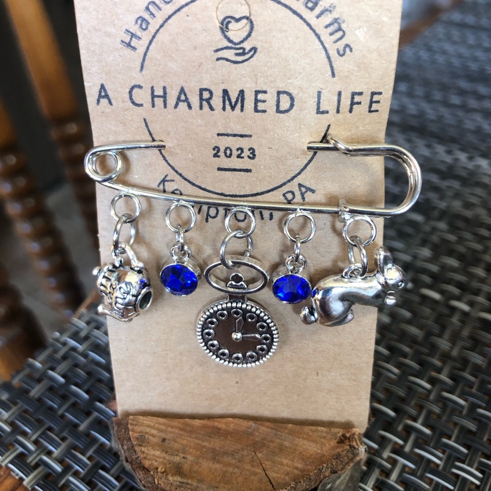 NWT, Handmade by A Charmed Life. Silver Pin with Alice in Wonderland Charms